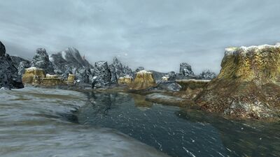Here, the river flows slowly past the wyrm nests and geysers that mark this terrain.